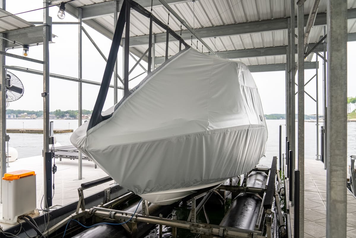 Marine Concepts custom boat cover in a covered slip